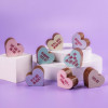 Bagstock & Bumble’s Perimenopause Obnoxious Chocs arranged on mini plinths – heart-shaped chocolate treats with bold one-liners like ‘What was I doing?’ and ‘She came. She saw. She forgot why.’ A funny gift for the forgetful and fabulous.