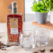 Decorated bottle of rum & 2 Tumblers