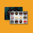 A box of 12 luxury chocolates with a 'Happy Christmas' message