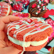 VG Strawberries & Cream Cookie Sandwich – a pink vegan cookie filled with strawberry buttercream and Valentine sprinkles.