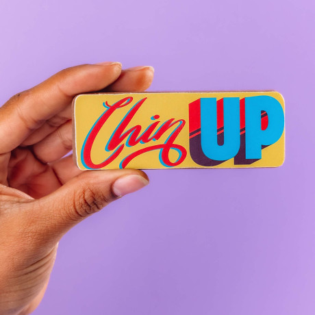 'Chin up' retro-style colourful slogan printed onto a milk chocolate picture bar